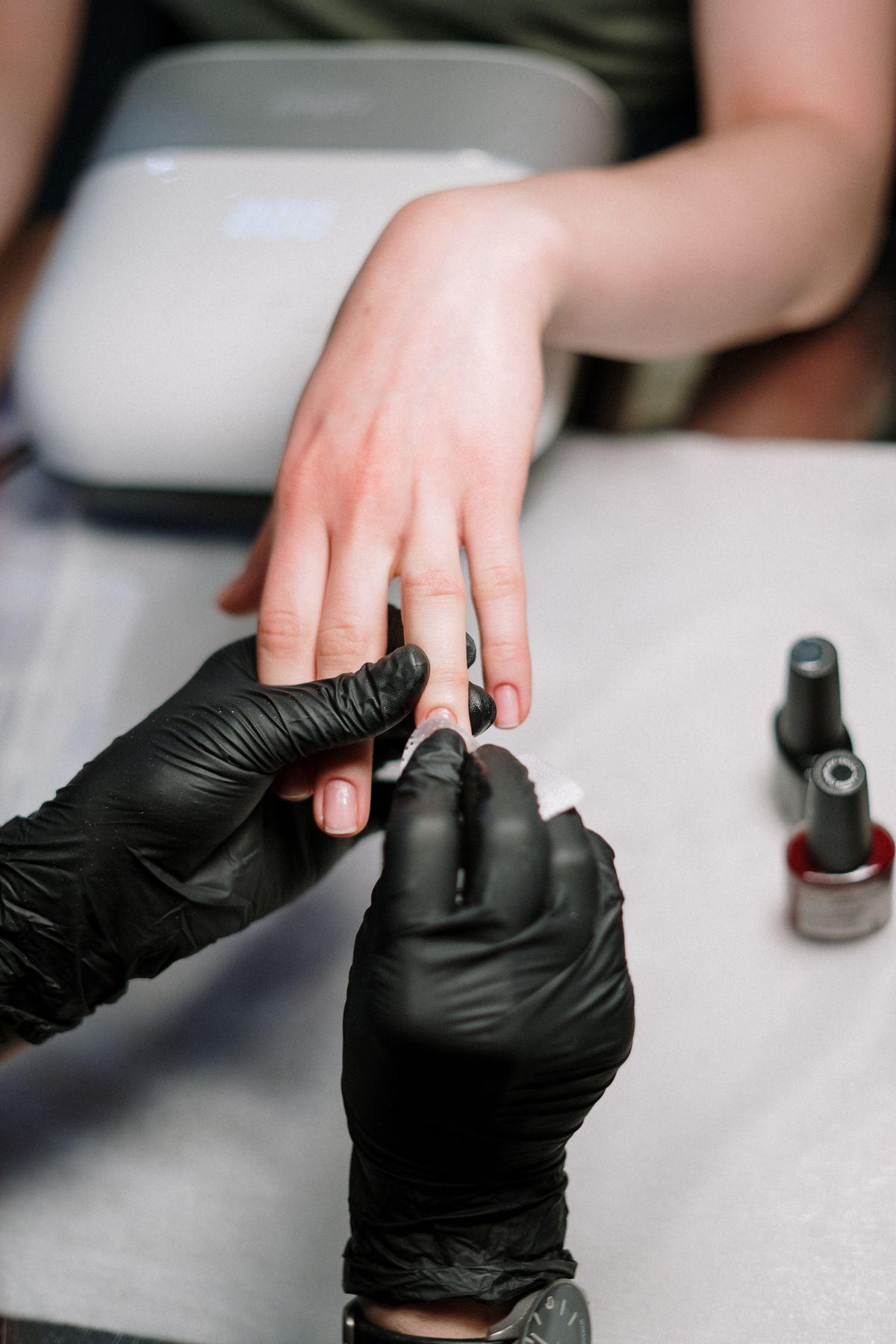 Manicure being finished at Dragon Nails, Round Rock TX